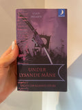 Under lysande måne – framsida