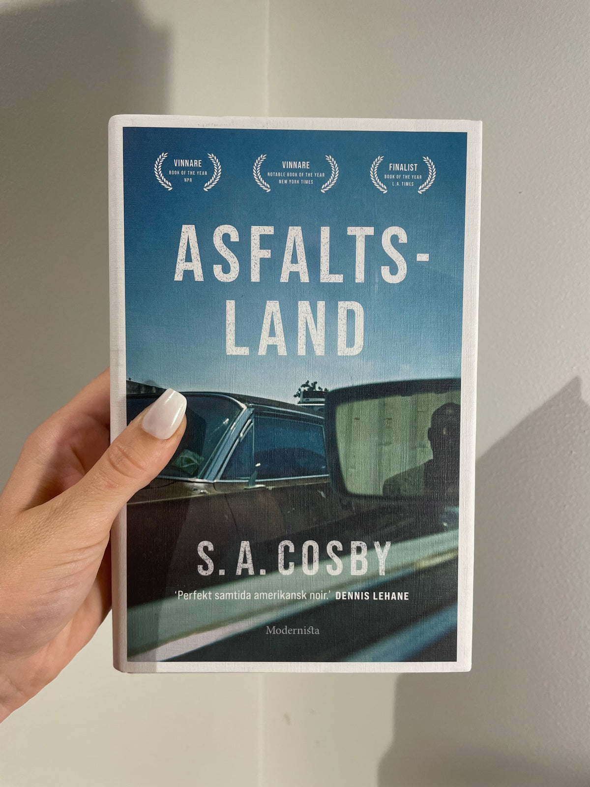 Asfaltsland – framsida